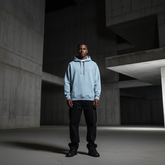 Light blue hoodie with a small white logo on male model