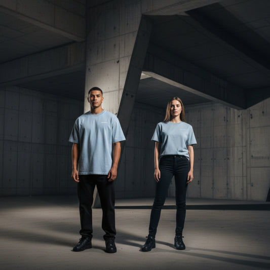 LIGHT BLUE T-SHIRT WITH SMALL WHITE CHEST LOGO ON BOTH MALE AND FEMALE MODEL