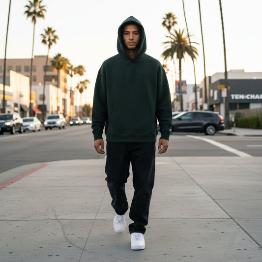 Black hoodie with black chest  print on male model in LA